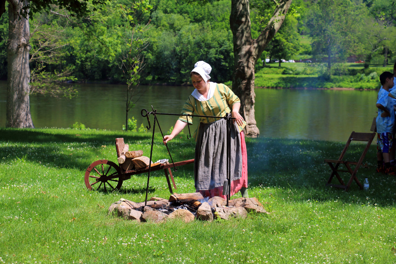 a person cooking BBQ