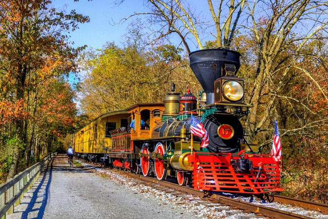 Train ride thru fall foliage on Heritage Rail Trail