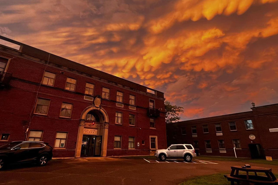 A building with a sunset in the background