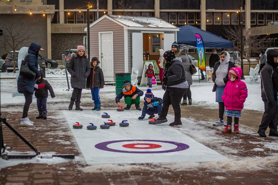 Kids playing ice curling