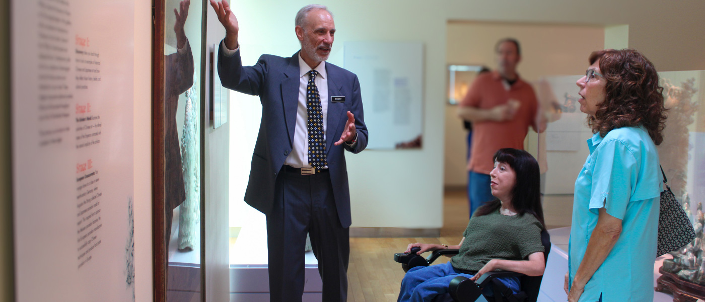 a museum guide giving a tour of the Maridon Museum