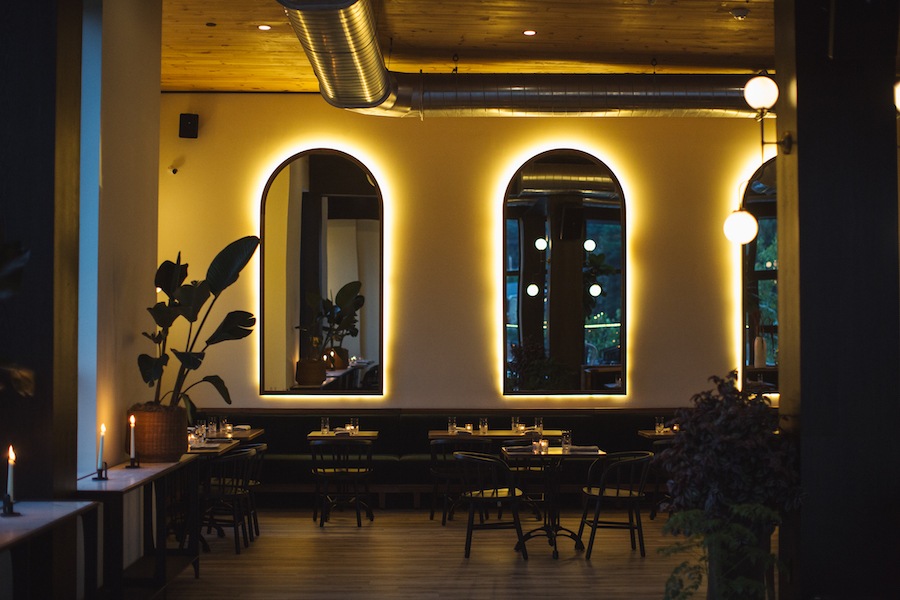 beautiful dining space at a restaurant with candle lights
