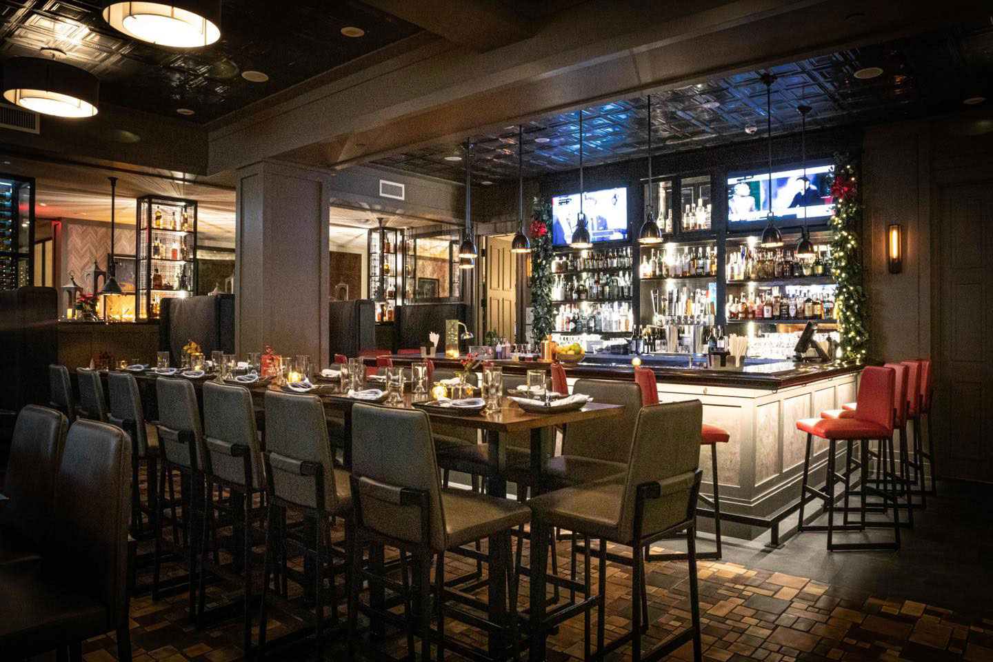 A restaurant and bar with tables and chairs