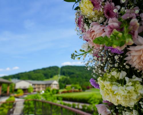 flowers with resort in the background